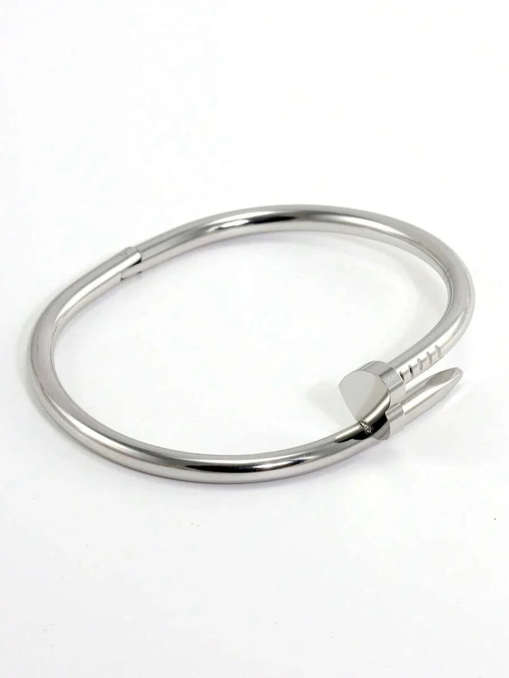 Gleaming Gold Tone Stainless Steel Four Leaf Clover Bangle